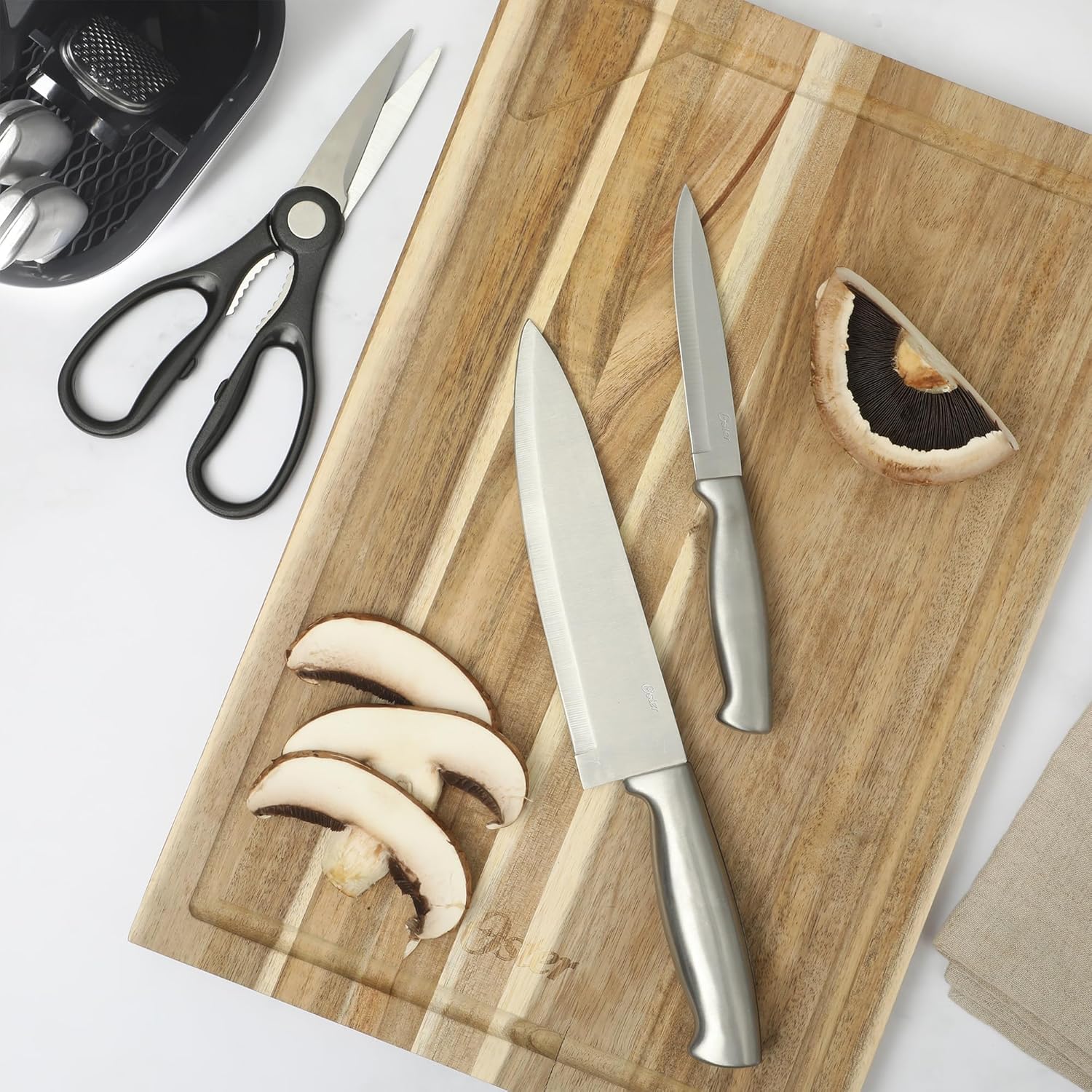 Juego de utensilios de cocina y cubiertos de acero inoxidable y nailon de 12 piezas Oster Baldwyn